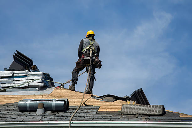 Professional Roofing technician working in Highlands, TX